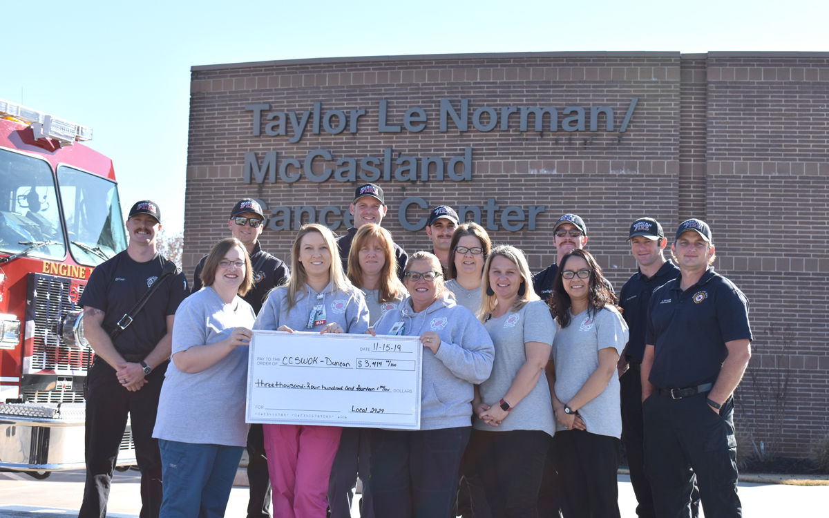 Firefighters back the pink for Cancer Center